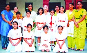 The winners of Food safety and quality quiz contest with principal and teachers at Shiv Jyoti School in Jalandhar