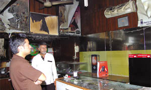 Timely action by the watchman gave the owner enough time to shift expensive items to a safer place.