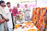 Skilled workers pray to Vishwakarma in Jammu on Wednesday. 