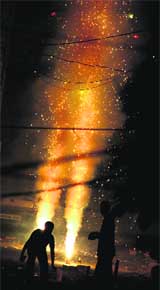 People burst crackers in Ludhiana on Diwali.