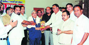 Press club members present a citation to CDLU V-C K.C. Bhardwaj at a function in Sirsa.