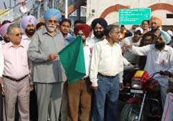 Irrigation minister Janmeja Singh Sekhon flagging off a team of youth to spread awareness about HIV/AIDS in various villages of the district. Earlier, the minister along with district officials received the Red Ribbon Express on its arrival in Ferozepur. 