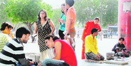 Vendors sell their wares at Sector 17 in Chandigarh.