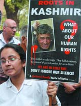 Kashmiri pandits demand the intervention of UN secretary general Ban Ki Moon, who is on a two-day visit to India, outside the United Nations High Commission for Refugees office in New Delhi