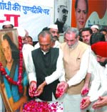 DPCC president Jai Prakash Agarwal and MP Sajjan Kumar pay homage to former Prime Minister Indira Gandhi on her 24th death anniversary at the DPCC office in New Delhi