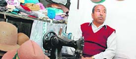Karke in his shop. 