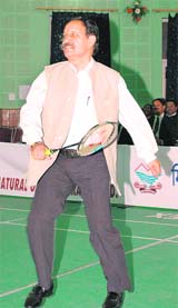 Chief Minister BC Khanduri flicks a shuttle at the inauguration of the first All-India Police Badminton Championship on Friday