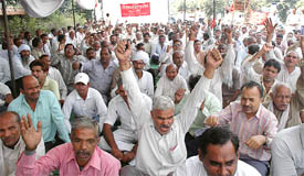 State government employees stage a protest in support of their demands at the Gurgaon mini secretariat on Friday.