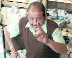 Smoking banned all over India ? So what, after all, this is the library of the Himachal Art, Culture and Language Academy. The activity can go on here, seems to convey this gentleman with a cigarette in fingers. 