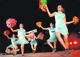 Cheer leaders perform during the ICL match in Panchkula