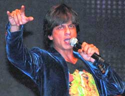 Bollywood actor Shah Rukh Khan performs at the Rock On for Humanity concert in Mumbai on Friday. The concert was held to collect aid for the flood victims of Bihar. 