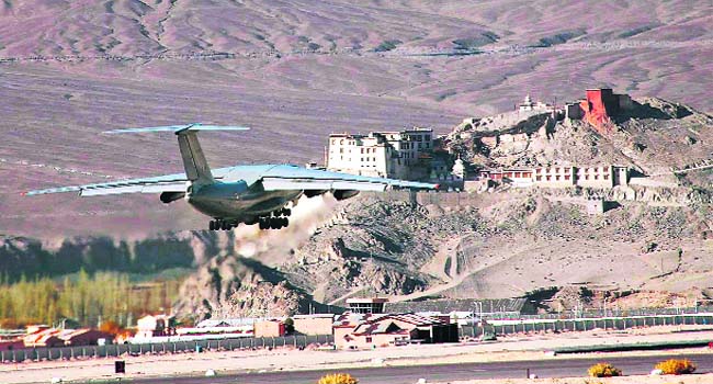 An IAF transport aircraft takes off from the countrys highest- altitude airport