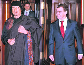 Russian President Dmitry Medvedev (right) and Libyan leader Moammar Gadhafi are seen during their meeting in the Gorki residence, outside Moscow, on Friday.