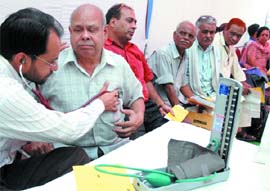 People get their blood pressure and heart checked at the 10th Diabetes Health Mela-2008 at V .P. House lawn in New Delhi on Sunday. 