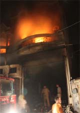 A cotton godown in Jakum Pura that caught fire on Saturday. 