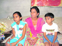Ramandeep, along with her daughter Amandeep and son Harleen, narrates her tale of woe at her residence in Sirsa on Sunday.