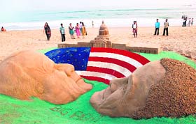 A sand sculpture of US presidential candidates John McCain and Barack Obama, created by sand artist Sudarsan Pattnaik, is seen at a beach in Puri
