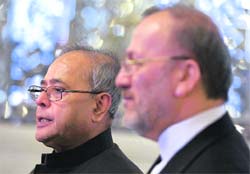 External affairs minister Pranab Mukherjee speaks to journalists as he attends a news conference with his Iranian counterpart Manouchehr Mottaki in Tehran on Sunday.