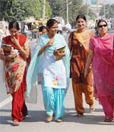 With weather becoming pleasant in Bathinda, girls enjoy a walk on the Power House road.