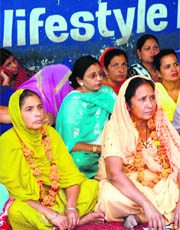 Anganwari workers of Punjab sit on hunger strike in Sector 34, Chandigarh, on Monday.