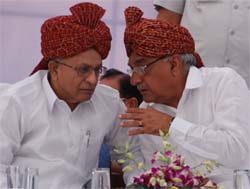 Union urban development minister S. Jaipal Reddy (left) and Haryana Chief Minister Bhupinder Singh Hooda at a public meeting after laying stone for four-laning, widening and strengthening a road network at Nuh (Mewat) on Monday. 