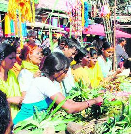 Women make Chhat Puja purchases in Gurgaon.