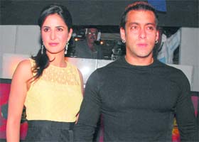 Bollywood actors Salman Khan (R) and Katrina Kaif pose during a promotional event for their upcoming movie Yuvvraj on a television show in Mumbai