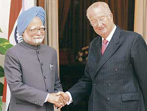 Belgium's King Albert II shakes hands with Prime Minister Manmohan Singh prior to a meeting at Hyderabad House in New Delhi on Tuesday.