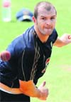 Australias Jason Krejza bowls during a practice session in Nagpur