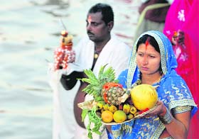 Devotees observe Chhat Puja at newly created lake at Sector 42