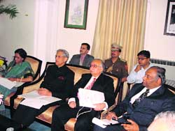 Governor B.L. Joshi (2L) chairs a meeting of ex-servicemen. 