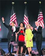 US President-elect Senator Barack Obama, his wife Michelle, Vice-President-elect Joe Biden and wife Jill wave to supporters