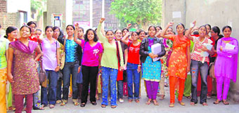Students of DD Jain College protest against fee hike in Ludhiana on Thursday.
