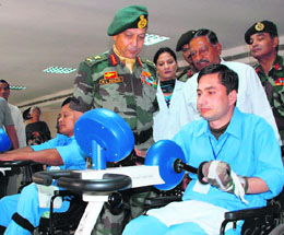 The Vice-Chief of the Army Staff, Lt Gen M.L. Naidu, with inmates of the Paraplegic Rehabilitation Centre in Mohali on Friday.