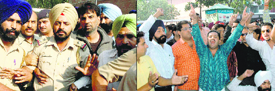 The CBI officials take away SI Sanjiv Kumar, in charge of the Neelam police post, after arresting him in a corruption case from Plaza in Sector 17, Chandigarh, on Friday; and right: Shopkeepers raise slogans in Sector 17 on Friday against the CBI, alleging that the SI Sanjiv Kumar was arrested in a false case.