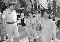 Razia (centre) while coming out of district courts, Sector 17 along with her sister-in-law after recording her statement here on Friday.