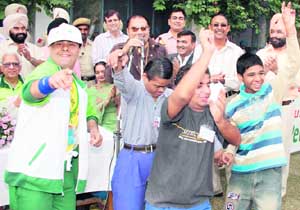 Special children enjoy with singer Labh Janjua in Ludhiana on Friday. 