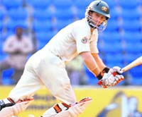 Australia's Simon Katich plays a shot on the second day of the fourth and final Test between India and Australia at the Vidarbha Cricket Association stadium, Jamtha, in Nagpur