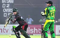 Dhaka Warriors' Shahriar Nafees plays a shot during the ICL T20 match against Lahore Badshahs at the Sardar Patel cricket ground in Ahmedabad