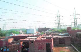 Illegal structures that have come up under high-tension lines in Balongi village, Mohali