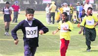 Love Singh of Nirdosh School, Ludhiana, in action during the 50 m race of 11th Punjab State Special Olympics at Guru Nanak Public School in Ludhiana