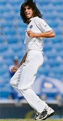 Ishant Sharma celebrates the wicket of Michael Clarke.