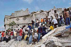 Residents search for survivors from the rubbles of the church school that collapsed on the outskirts of Haitiss capital Port-au-Prince on Friday, burying dozens and killing at least 75, many of them children.