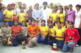 Gopi Chand Arya Mahila College basketball team in celebration mood after winning a tourney in Abohar