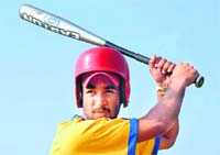 Ravinder Singh of SGGS College, Sector 26, in action during the Panjab University Inter-College Baseball Championship played at PU grounds on Sunday. 