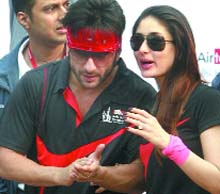 Bollywood actors Saif Ali Khan and Kareena Kapoor at the Delhi Half Marathon in New Delhi on Sunday.