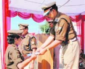 DGP Subhash Joshi honours SI Neelam Rawat.