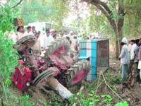 The ill-fated tractor-trailer that met with an accident near Sirsa on Sunday. 