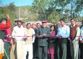 Chief Minister Prem Kumar Dhumal inaugurates a bridge on the Jalal river at Dadahu