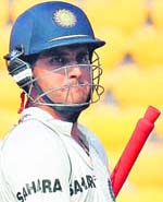 Sourav Ganguly walks back after being dismissed for a duck in the last innings of his international career on the fourth day of the fourth Test between India and Australia in Nagpur on Sunday.